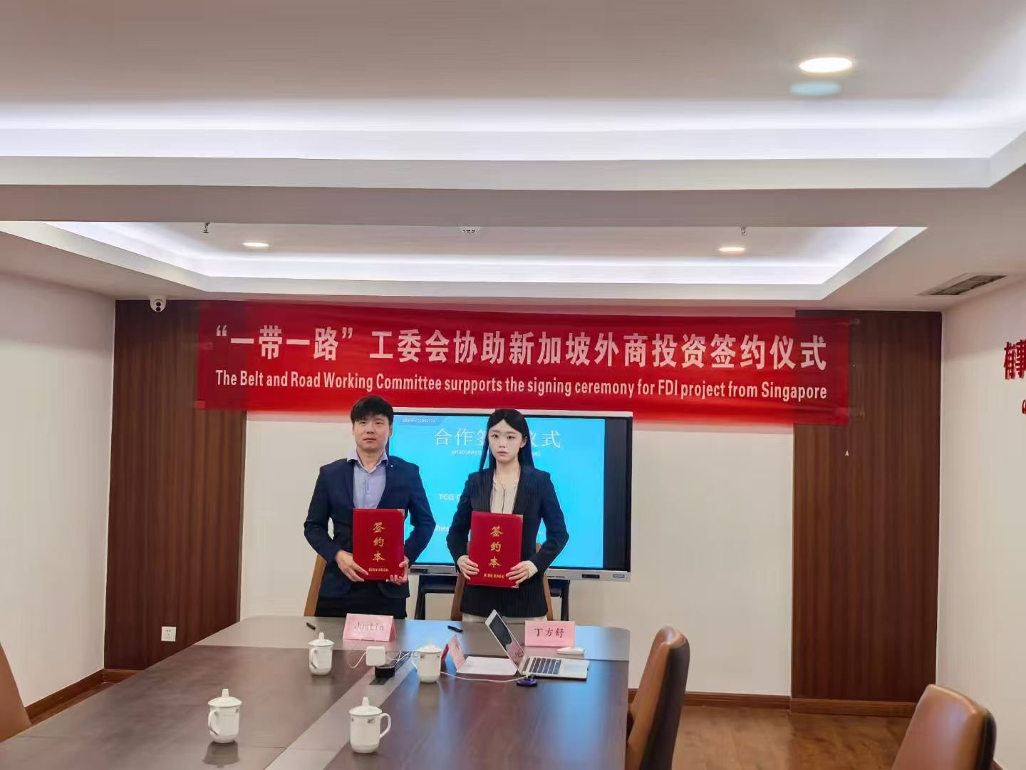 Contract books handover between TCG Consultancy Pte Ltd and Rheaura Group